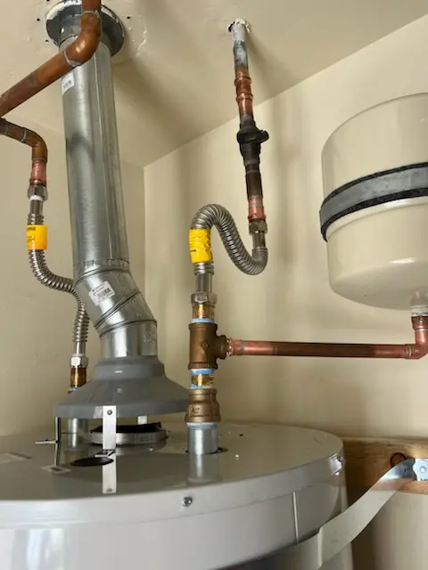 Water heater installation and plumbing repair in Tippett